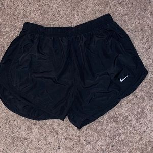 Black Nike running shorts